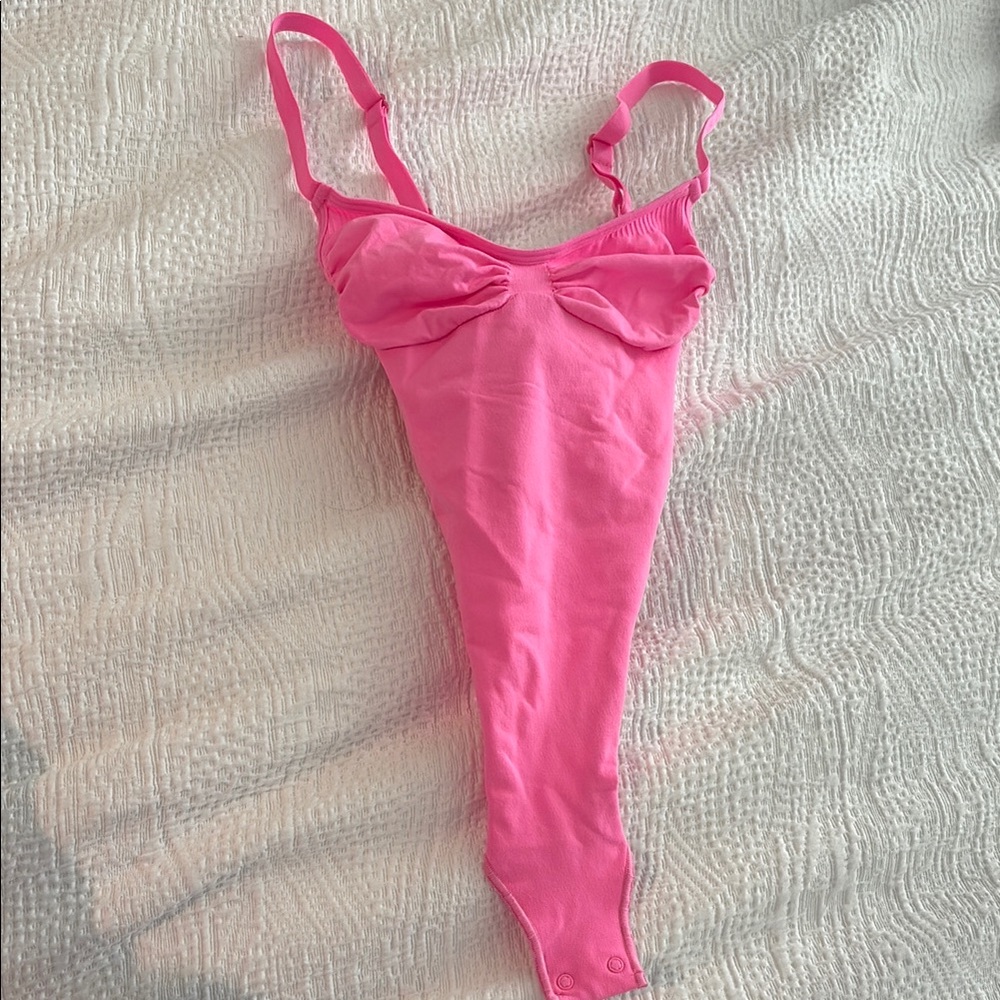 SKIMS pink bodysuit
